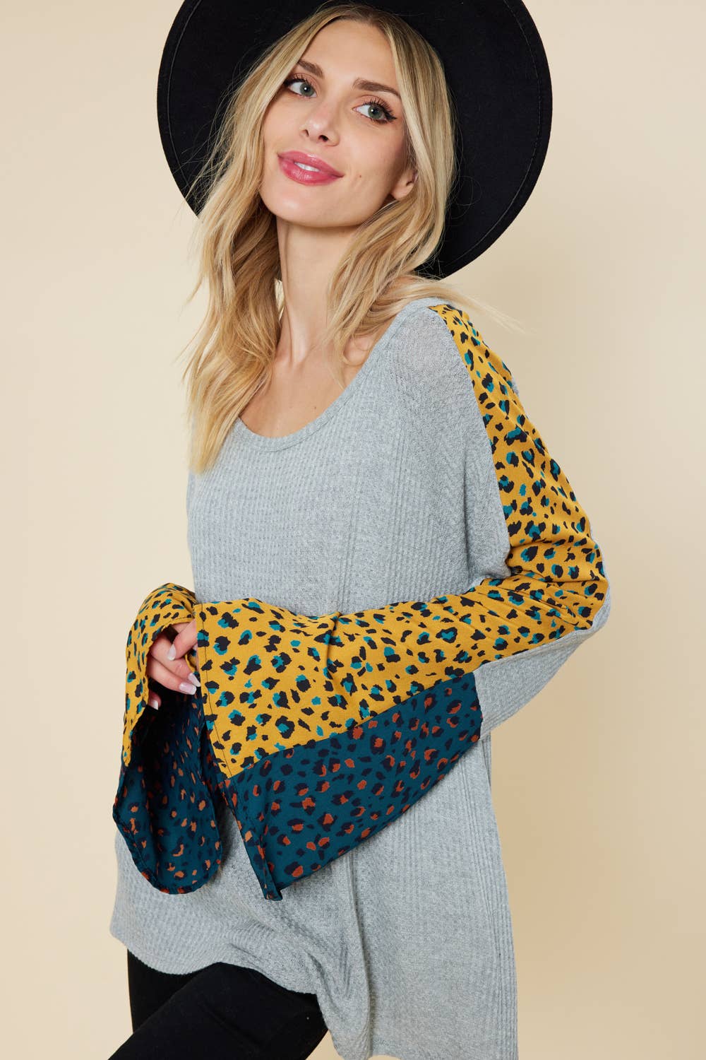 Bell sleeve top with color contrast leopard print