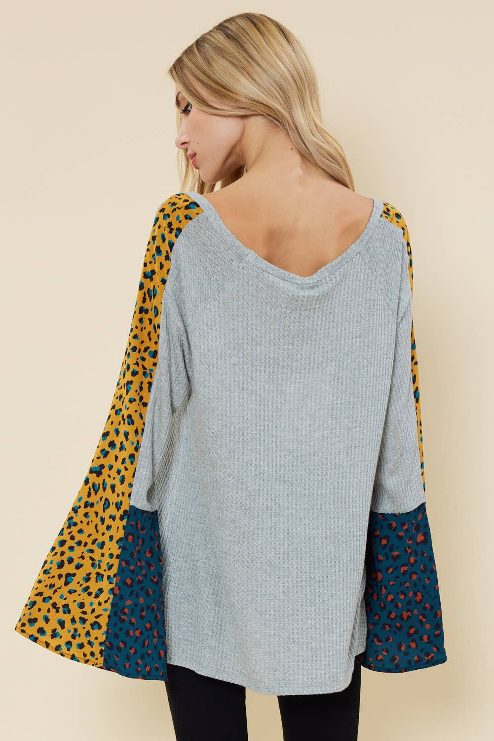 Bell sleeve top with color contrast leopard print