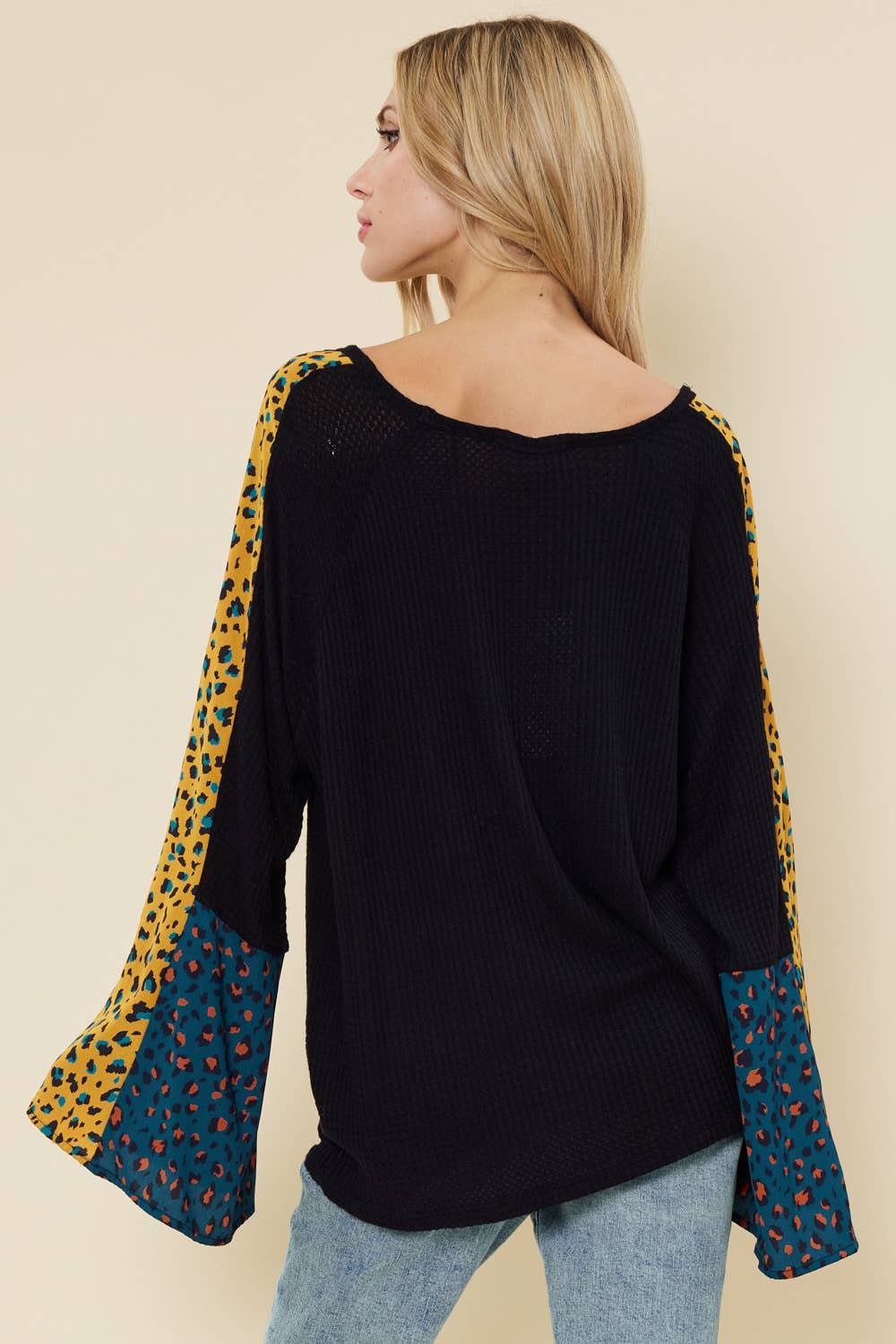 Bell sleeve top with color contrast leopard print